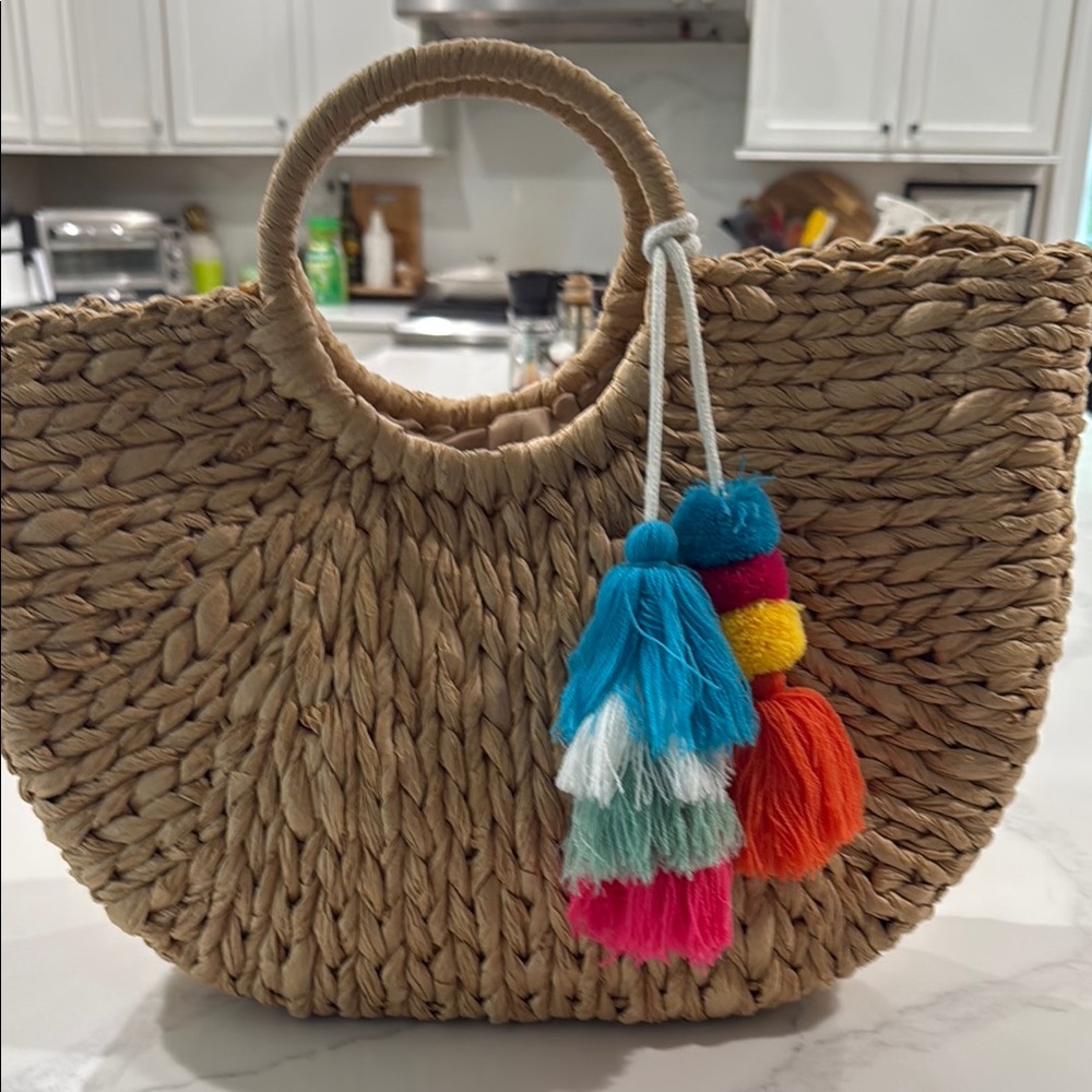 Chic Straw Tote with Vibrant Tassels